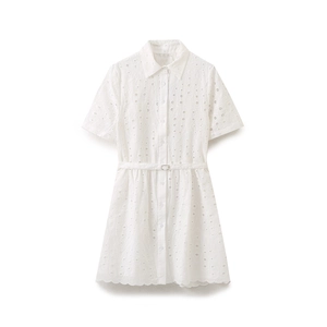 Detail of white short sleeve eyelet embroidery dress featuring delicate scalloped edges