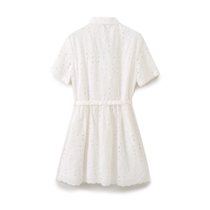 Rear view of white eyelet embroidery mini dress with short sleeves and waist tie detail