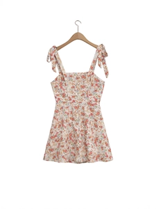 Women's floral slip dress with tie-shoulder straps and A-line waist in cream floral print