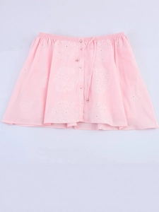 Pink mini shirt dress featuring floral embroidery, drawstring waist, and button front