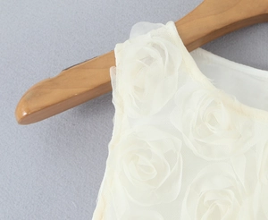 Detail of 3D fabric rose flower decoration on white mesh sleeveless maxi dress