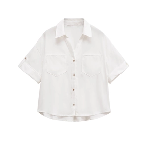 Detailed flat lay of white short sleeve shirt with lapel collar and chest pockets
