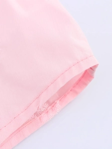Chemise rose à manches longues avec broderie raffinée et tissu tissé de qualité