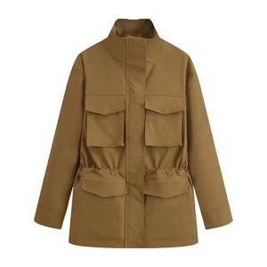 Detail of khaki utilitarian jacket featuring a stand collar and four flap pockets