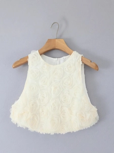 Elegant sleeveless cream lace dress featuring 3D floral embroidery and hidden zipper detail