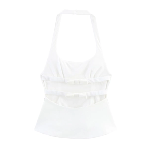 Detail of white halter top featuring an open back design and two decorative bow ties