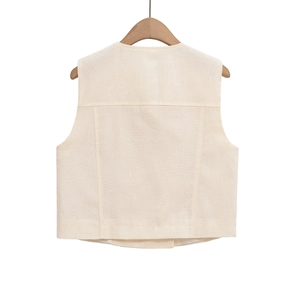 Detail view of the beige sleeveless vest back featuring premium cotton linen fabric texture