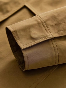 Women's khaki cargo jacket with high collar and reinforced double stitching detail