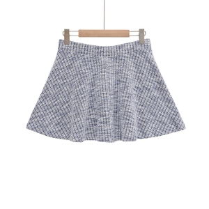 Detailed view of the blue and white tweed texture on this A-line mini skirt