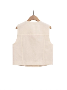 Rear view of cream sleeveless vest with linen texture and high waist shorts set