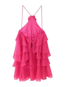 Detailed back view of pink halter dress with tiered ruffles and criss-cross straps