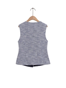 Elegant tweed vest for women with blue and white woven texture and a tailored back silhouette