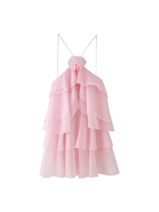 Pink halter dress with layered ruffles and a 3D flower accent on white background