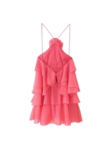 Pink sleeveless mini dress with layered ruffles and cross-back straps on white background