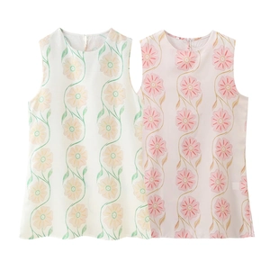 Two sleeveless floral mini dresses in white and pink prints with a round neckline