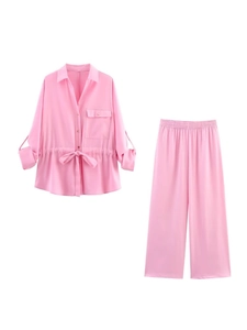 Pink two-piece set featuring long sleeve drawstring shirt and wide-leg trousers for women