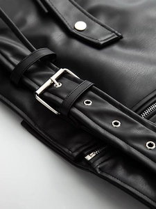 Women's faux leather biker jacket with silver buckle belt and textured lapel finish