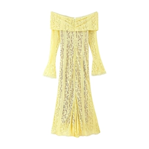Detail of off-the-shoulder neckline and bell sleeves on yellow lace dress