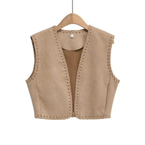 Detail view of camel suede vest showing whipstitched edges and premium fabric texture