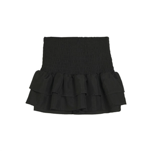 Détail de la taille élastique froncée noire et de l'ourlet à volants triple épaisseur