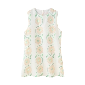 White sleeveless A-line floral top with vintage yellow flowers and green vines