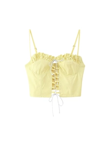 Pale yellow cropped camisole with thin straps, ruffle trim and front drawstring tie