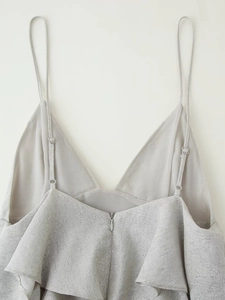 Silver layered ruffled summer dress with adjustable straps and metallic glitter texture