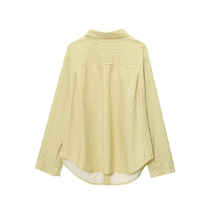 Detail of yellow striped shirt back showing the yoke pleats and curved hemline
