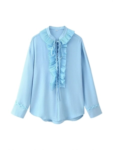 Light blue long sleeve women's shirt with layered ruffles and lace-up neck detail