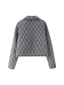 Back view of a grey quilted denim jacket featuring a classic lapel and washed fabric texture
