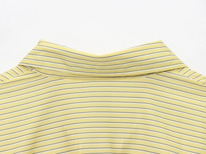 Detail shot of a yellow and white striped cotton shirt collar with neat stitching