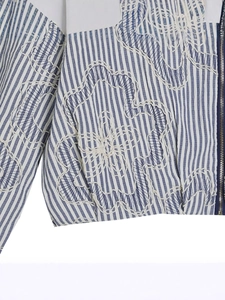 Vertical blue striped bomber jacket with beige floral embroidery and metal zipper