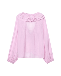 Detail of pink chiffon blouse with layered ruffles and backless V-cut design