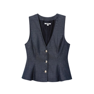 Detailed close-up of dark blue denim peplum vest with metallic buttons and slim fit cut