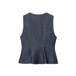 Detail of navy blue slim fit vest with peplum hem and denim texture on a white background