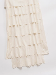 Elegant cream beige layered mini dress with tiered ruffles and lightweight woven fabric