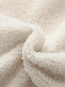 Cozy cream white sherpa fleece coat with a high collar and soft textured material