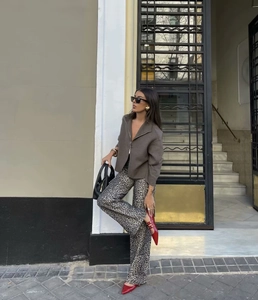 Chic women long sleeve brown knit jacket paired with leopard print high waist wide leg pants