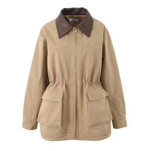 Detail of khaki drawstring waist jacket with contrast brown leather collar and large pockets