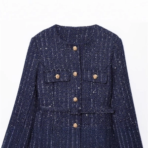 Navy blue tweed jacket for women featuring gold buttons and subtle sequins in a stylish cut