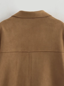 Detail view of the caramel brown suede jacket back with clean horizontal and vertical stitching