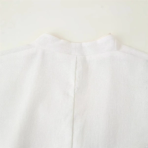 White linen V-neck kimono jacket with detailed back neckline and minimalist stand collar