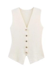 Detail of V-neck knit vest featuring textured cream fabric and gold buttons