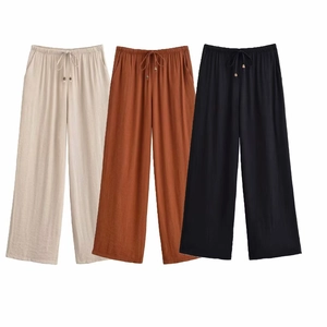 Detailansicht der High-Waist-Weitbeinhose in Beige, Karamell und Schwarz mit Kordelzug