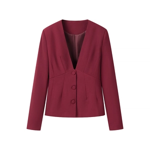 Detailed close-up of slim fit burgundy V-neck blazer with fabric-covered buttons