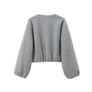 Back view of a grey long-sleeved cropped bomber jacket with soft fleece texture and elastic hem