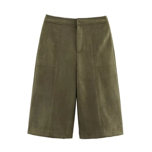 Detail of olive green faux suede A-line shorts with a high-waisted flat front design