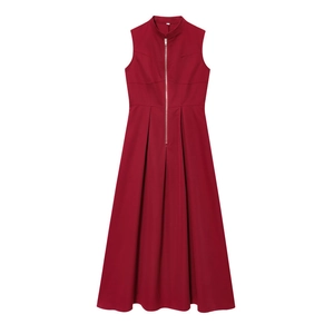 Detail of burgundy sleeveless dress featuring front silver zipper and pleated A-line skirt
