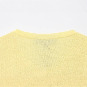 Women summer pale yellow knit top featuring a round ribbed neckline and fine texture