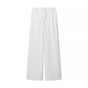 Detail of white high-waist wide-leg trousers featuring button fly and sleek pleated design